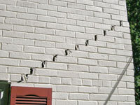 stair-step-foundation-wall-cracks-thm